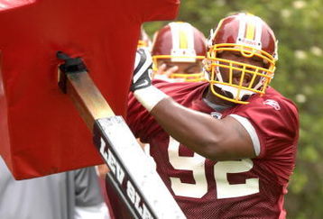 ASHBURN, VA - MAY 1:  Albert Haynesworth #92 of the Washington Redskins runs through drills during minicamp on May 1, 2009 at Redskins Park in Ashurn, Virginia.   (Photo by Mitchell Layton/Getty Images)