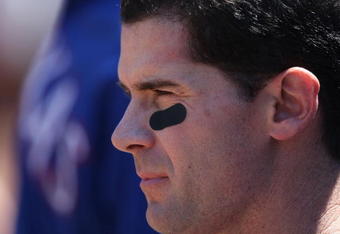 OAKLAND, CA - MAY 07:  Michael Young #10 of the Texas Rangers looks on against the Oakland Athletics during a Major League Baseball game on May 7, 2009 at the Oakland Coliseum in Oakland, California.  (Photo by Jed Jacobsohn/Getty Images)