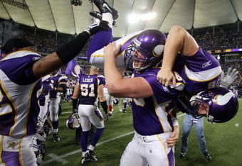 MINNEAPOLIS - DECEMBER 28:   Ryan Longwell #8 of the Minnesota Vikings is carried by Cullen Loeffler #46 after Longwell kicked the game winning field goal with five seconds left in the game against the New York Giants on December 28,2008 at the Hubert H. Humphrey Metrodome in Minneapolis, Minnesota. The Vikings defeated the Giants 20-19.  (Photo by Elsa/Getty Images)