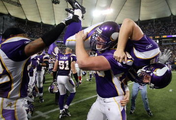 MINNEAPOLIS - DECEMBER 28:   Ryan Longwell #8 of the Minnesota Vikings is carried by Cullen Loeffler #46 after Longwell kicked the game winning field goal with five seconds left in the game against the New York Giants on December 28,2008 at the Hubert H. Humphrey Metrodome in Minneapolis, Minnesota. The Vikings defeated the Giants 20-19.  (Photo by Elsa/Getty Images)