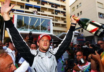 MONTE CARLO, MONACO - MAY 24:  Jenson Button of Great Britain and Brawn GP celebrates winning the Monaco Formula One Grand Prix at the Monte Carlo Circuit on May 24, 2009 in Monte Carlo, Monaco.  (Photo by Paul Gilham/Getty Images)
