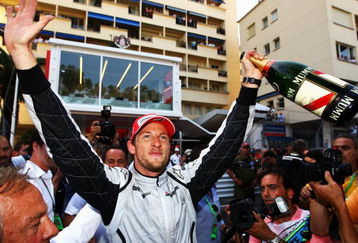 MONTE CARLO, MONACO - MAY 24:  Jenson Button of Great Britain and Brawn GP celebrates winning the Monaco Formula One Grand Prix at the Monte Carlo Circuit on May 24, 2009 in Monte Carlo, Monaco.  (Photo by Paul Gilham/Getty Images)
