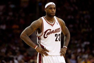 CLEVELAND - MAY 22:  LeBron James #23 of the Cleveland Cavaliers looks on between plays against the Orlando Magic in Game Two of the Eastern Conference Finals during the 2009 Playoffs at Quicken Loans Arena on May 22, 2009 in Cleveland, Ohio. NOTE TO USER: User expressly acknowledges and agrees that, by downloading and or using this photograph, User is consenting to the terms and conditions of the Getty Images License Agreement  (Photo by Gregory Shamus/Getty Images)