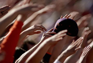 CLEMSON, SC - NOVEMBER 12:  Fans of the Clemson Tigers raise their hands to show their team support against the Florida State Seminoles during an Atlantic Coast Conference game on November 12, 2005 at Clemson Memorial Stadium in Clemson, South Carolina.  The Clemson Tigers  defeated the Florida State Seminoles 35-14. (Photo By Grant Halverson/Getty Images)