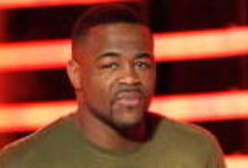 CULVER CITY, CA - DECEMBER 14:  UFC fighter Rashad Evans presents the Best Shooter award onstage at Spike TV's 2008 'Video Game Awards' held at Sony Pictures' Studios on December 14, 2008 in Culver City, California.  (Photo by Kevin Winter/Getty Images for Spike TV)
