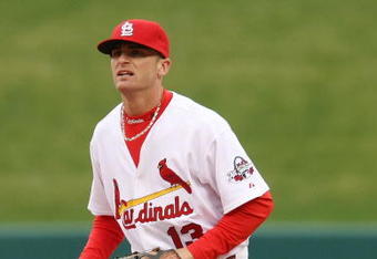 ST. LOUIS - APRIL 06:  Brendan Ryan #13 of the St. Louis Cardinals stands in the ready position against the Pittsburgh Pirates during Opening Day on April 6, 2009  at Busch Stadium in St. Louis, Missouri. The Pittsburgh Pirates defeated the St. Louis Cardinals 6-4.  (Photo by Elsa/Getty Images)