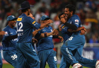 CAPE TOWN, SOUTH AFRICA - APRIL 19:  RP Singh lifts Rohit Sharma (R) of the Deccan Chargers after running out Ajit Agarkar of Kolkata during the IPL T20 match between Deccan Chargers and Kolkata Knight Riders on April 19, 2009 in Cape Town, South Africa.  (Photo by Tom Shaw/Getty Images)