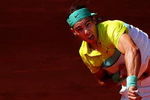 MADRID, SPAIN - MAY 16:  Rafael Nadal of Spain serves the ball to Novak Djokovic of Serbia in his semi-final match during the Madrid Open tennis tournament at the Caja Magica on May 16, 2009 in Madrid, Spain. Nadal won the match in three sets, 3-6, 7-6 and 7-6.  (Photo by Jasper Juinen/Getty Images)
