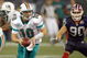 TORONTO, ON - DECEMBER 07: Quarterback Chad Pennington #10 of the Miami Dolphins looks to hand off the ball during the game against the Buffalo Bills on December 7, 2008 at Rogers Centre in Toronto, Ontario, Canada. The Dolphins won 16-3. (Photo by Rick Stewart/Getty Images)