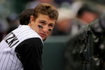 DENVER - APRIL 26:  Troy Tulowitzki #2 of the Colorado Rockies looks on from the dugout against the Los Angeles Dodgers at Coors Field on April 26, 2009 in Denver, Colorado. The Rockies and defeated Dodgers 10-4.  (Photo by Doug Pensinger/Getty Images)
