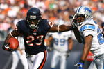 CHICAGO - NOVEMBER 02:  Devin Hester #23 of the Chicago Bears stiff arms Leigh Bodden #28 of the Detroit Lions during the first quarter at Soldier Field on November 2, 2008 in Chicago, Illinois. The Bears defeated the Lions 27-23.  (Photo by Jeff Gross/Getty Images)