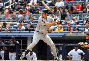 NEW YORK - MAY 17:  Joe Mauer #7 of the Minnesota Twins bats against the New York Yankees on May 17, 2009 at Yankee Stadium in the Bronx borough of New York City. The Yankees defeated the Twins 3-2 in ten innings.  (Photo by Jim McIsaac/Getty Images)