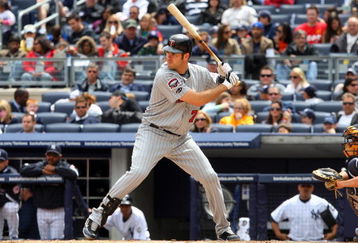 NEW YORK - MAY 17:  Joe Mauer #7 of the Minnesota Twins bats against the New York Yankees on May 17, 2009 at Yankee Stadium in the Bronx borough of New York City. The Yankees defeated the Twins 3-2 in ten innings.  (Photo by Jim McIsaac/Getty Images)