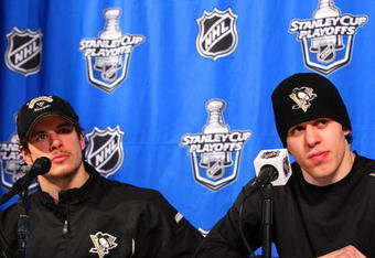 RALEIGH, NC - MAY 23:  Sidney Crosby #87 and Evgeni Malkin #71 of the Pittsburgh Penguins talk to the media after their 6-2 win over the Carolina Hurricanes in Game Three of the Eastern Conference Championship Round of the 2009 Stanley Cup Playoffs at RBC Center on May 23, 2009 in Raleigh, North Carolina.  (Photo by Jim McIsaac/Getty Images)