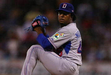SAN JUAN, PUERTO RICO - MARCH 10:  Pedro Martinez #45 of The Dominican Republic pitches against The Netherlands during the 2009 World Baseball Classic Pool D match on March 10, 2009 at Hiram Bithorn Stadium in San Juan, Puerto Rico.  (Photo by Al Bello/Getty Images)