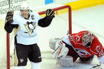 RALEIGH, NC - MAY 23:  Sidney Crosby #87 of the Pittsburgh Penguins reacts after scoring a goal against goaltender Cam Ward #30 of the Carolina Hurricanes during Game Three of the Eastern Conference Championship Round of the 2009 Stanley Cup Playoffs at RBC Center on May 23, 2009 in Raleigh, North Carolina.  (Photo by Grant Halverson/Getty Images)