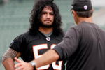 CINCINNATI, OH - MAY 1:  Cincinnati Bengals second round draft pick Rey Maualuga #58 listens to linebackers coach Jeff Fitgerald during rookie minicamp at Paul Brown Stadium on May 1, 2009 in Cincinnati, Ohio.  (Photo by Mark Lyons/Getty Images)