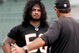 CINCINNATI, OH - MAY 1:  Cincinnati Bengals second round draft pick Rey Maualuga #58 listens to linebackers coach Jeff Fitgerald during rookie minicamp at Paul Brown Stadium on May 1, 2009 in Cincinnati, Ohio.  (Photo by Mark Lyons/Getty Images)