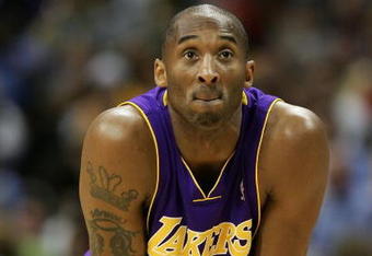 DENVER - MAY 23:  Kobe Bryant #24 of the Los Angeles Lakers looks on against the Denver Nuggets in Game Three of the Western Conference Finals during the 2009 NBA Playoffs at Pepsi Center on May 23, 2009 in Denver, Colorado. NOTE TO USER: User expressly acknowledges and agrees that, by downloading and or using this photograph, User is consenting to the terms and conditions of the Getty Images License Agreement.  (Photo by Jed Jacobsohn/Getty Images)