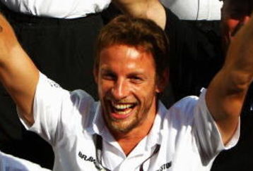 MONTE CARLO, MONACO - MAY 24:  Jenson Button of Great Britain and Brawn GP celebrates in the paddock following victory in the Monaco Formula One Grand Prix at the Monte Carlo Circuit on May 24, 2009 in Monte Carlo, Monaco.  (Photo by Paul Gilham/Getty Images)