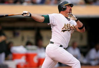 OAKLAND, CA - MAY 23:  Jason Giambi #16 of the Oakland Athletics hits his 400th career home run in the fourth inning of their game against the Arizona Diamondbacks at the Oakland Coliseum on May 23, 2009 in Oakland, California.  (Photo by Ezra Shaw/Getty Images)