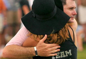 IRVING TX - MAY 24: Rory Sabbatini is congratulated by his wife Amy on the 18th hole during the fourth and final round of the HP Byron Nelson Championship held at the TPC Four Seasons Resort Las Colinas on May 24, 2009 in Irving, Texas. (Photo by Marc Feldman/ Getty Images)