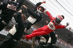 INDIANAPOLIS - MAY 24: Helio Castroneves, driver of the #3 Team Penske Dallara Honda, celebrates his victory with his pit crew and team during the IRL IndyCar Series 93rd running of the Indianapolis 500 on May 24, 2009 at the Indianapolis Motor Speedway in Indianapolis, Indiana. (Donald Miralle/Getty Images )