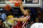 MEMPHIS, TN - MARCH 29:  Blake Griffin #23 of the Oklahoma Sooners dunks the ball over Ed Davis #32 of the North Carolina Tar Heels in the second half during the NCAA Men's Basketball Tournament South Regional Final at the FedExForum on March 29, 2009 in Memphis, Tennessee.  (Photo by Joe Murphy/Getty Images)