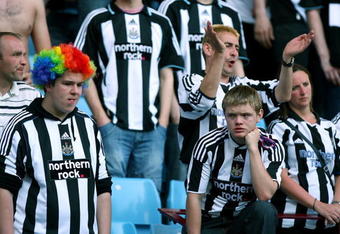 BIRMINGHAM, ENGLAND - MAY 24:  Newcastle United fans react after Newcastle United are relegated after their 0-1 defeat to Aston Villa during the Barclays Premier League match between Aston Villa and Newcastle United at Villa Park on May 24, 2009 in Birmingham, England.  (Photo by Michael Steele/Getty Images)