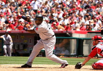 ANAHEIM, CA - MAY 14:  David Ortiz #34 of the Boston Red Sox strikes out swinging with the bases loaded to end the fourth inning against the Los Angeles Angels of Anaheim on May 14, 2009 at Angel Stadium in Anaheim, California.  The Angels won 5-4 in 12 innings.   (Photo by Stephen Dunn/Getty Images)