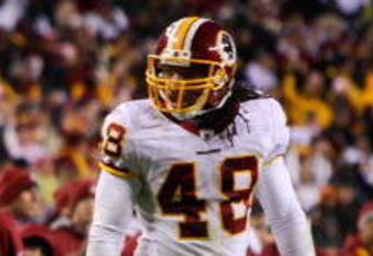 LANDOVER, MD - NOVEMBER 16:  Marion Barber #24 of the Dallas Cowboys celebrates a game-clinching first down in the fourth quarter while LaRon Landry #30 and Chris Horton #48 of the Washington Redskins react during the game on November 16, 2008 at FedEx Field in Landover, Maryland.  (Photo by Jim McIsaac/Getty Images)