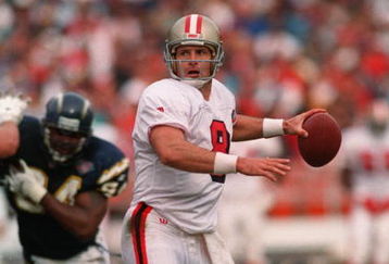 11 DEC 1994: SAN FRANCISCO 49ERS QUARTERBACK STEVE YOUNG THROWS A PASS IN THE 49ERS 38-15 VICTORY OVER THE SAN DIEGO CHARGERS.  Mandatory Credit: Stephen Dunn/ALLSPORT