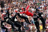 INDIANAPOLIS - MAY 24:  Helio Castroneves, driver of the #3 Team Penske Dallara Honda, celebrates winning the Indianapolis 500 by climbing the fence on May 24, 2009 at the Indianapolis Motor Speedway in Indianapolis, Indiana.  (Photo by Darrell Ingham/Getty Images)