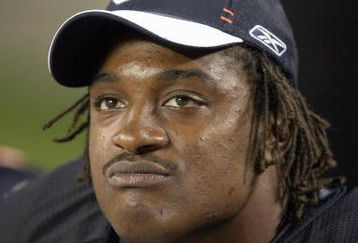 CHICAGO - AUGUST 25: Cedric Benson #32 of the Chicago Bears looks on from the bench during the game against the San Francisco 49ers on August 25, 2007 at Soldier Field in Chicago, Illinois. (Photo by Jonathan Daniel/Getty Images)