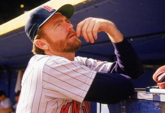 1989:  Bert Blyleven of the Minnesota Twins stands in the dugout during a game in the 1989 season.  (Photo by: Jonathan Daniel/Getty Images)