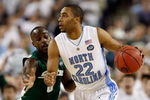 DETROIT - APRIL 06:  Wayne Ellington #22 of the North Carolina Tar Heels drives on Travis Walton #5 of the Michigan State Spartans during the 2009 NCAA Division I Men's Basketball National Championship game at Ford Field on April 6, 2009 in Detroit, Michigan.  (Photo by Streeter Lecka/Getty Images)
