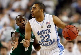 DETROIT - APRIL 06:  Wayne Ellington #22 of the North Carolina Tar Heels drives on Travis Walton #5 of the Michigan State Spartans during the 2009 NCAA Division I Men's Basketball National Championship game at Ford Field on April 6, 2009 in Detroit, Michigan.  (Photo by Streeter Lecka/Getty Images)