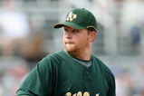 MESA, AZ - MARCH 03:  Brett Anderson #67 of the Oakland Athletics pitches against the Chicago Cubs during the spring training game at HoHoKam Park on March 3, 2009 in Mesa, Arizona. The Cubs defeated the A's 6-4.  (Photo by Christian Petersen/Getty Images)