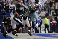 DALLAS - DECEMBER 16: Safety Quintin Mikell #27 of the Philadelphia Eagles intercepts a pass intended for wide receiver Terrell Owens #81 of the Dallas Cowboys in the first half at Texas Stadium December 16, 2007 in Dallas, Texas. The Eagles won 10-6. (Photo by Brian Bahr/Getty Images)