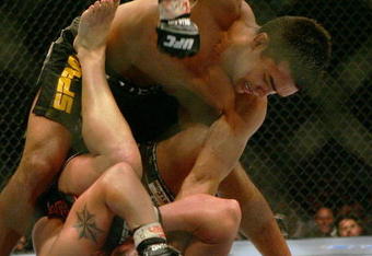 MANCHESTER, UNITED KINGDOM - APRIL 21: Lyoto Machida of Brazil and David Heath of England in action during a Welterweight bout of the Ultimate Fighting Championship at the Manchester Evening News Arena on April 21, 2007 in Manchester, England. (Photo by Gary M. Prior/Getty Images).