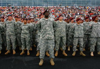 CONCORD, NC - MAY 24:  U.S. Army soldiers march during pre race ceremonies prior to the NASCAR Sprint Cup Series Coca-Cola 600 on May 24, 2009 at Lowe's Motor Speedway in Concord, North Carolina.  (Photo by Jason Smith/Getty Images for NASCAR)