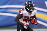 SAN DIEGO - NOVEMBER 30:  Running back Jerious Norwood #32 of the Atlanta Falcons returns a kick against the San Diego Chargers on November 30, 2008 at Qualcomm Stadium in San Diego, California.  The Falcons won 22-16.  (Photo by Stephen Dunn/Getty Images)