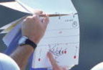 7 Aug 2000:  The New England Patriots go over their stategy from the playbook during the Patriots Training Camp at Bryant College in Smithfield, Rhode Island.Mandatory Credit: Jamie Squire  /Allsport