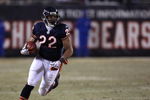 CHICAGO - DECEMBER 22: Matt Forte #22 of the Chicago Bears runs for yardage against the Green Bay Packers on December 22, 2008 at Soldier Field in Chicago, Illinois. The Bears defeated the Packers 20-17 in overtime. (Photo by Jonathan Daniel/Getty Images)