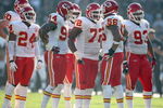 OAKLAND, CA - NOVEMBER 30:  Brandon Flowers #24, Jason Babin #94, Glenn Dorsey #72, Derrick Johnson #56 and Tank Tyler #93 of the Kansas City Chiefs huddle on the field against the Oakland Raiders during an NFL game on November 30, 2008 at the Oakland-Alameda County Coliseum in Oakland, California. (Photo by Jed Jacobsohn/Getty Images)