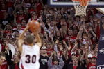 CHARLOTTE, NC - DECEMBER 06:  Stephen Curry #30 of the Davidson Wildcats shoots a free throw against the North Carolina State Wolfpack during their game at Time Warner Cable Arena on December 6, 2008 in Charlotte, North Carolina.  (Photo by Streeter Lecka/Getty Images)