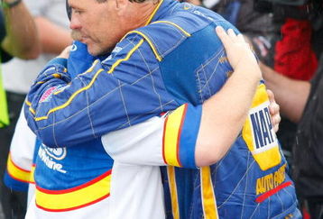 CONCORD, NC - MAY 25: Car owner Michael Waltrip hugs a crew member after David Reutimann (not pictured), driver of the #00 Aaron's Dream Machine Toyota was declared the winner of the NASCAR Sprint Cup Series Coca-Cola 600 on May 25, 2009 at Lowe's Motor Speedway in Concord, North Carolina. Reutimann won the Coca-Cola 600 due to a rain out on lap 227. (Photo by Geoff Burke/Getty Images for NASCAR)