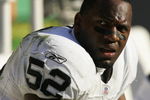KANSAS CITY, MO - NOVEMBER 19:  Linebacker Kirk Morrison #52 of the Oakland Raiders sits on the bench against the Kansas City Chiefs on November 19, 2006 at Arrowhead Stadium in Kansas City, Missouri.  The Chiefs won 17-13.  (Photo by Brian Bahr/Getty Images)