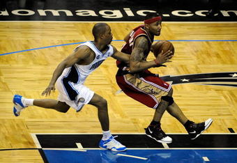 ORLANDO, FL - MAY 24:  Rafer Alston #1 of the Orlando Magic looks to steal the ball from Mo Williams #2 of the Cleveland Cavaliers in Game Three of the Eastern Conference Finals during the 2009 NBA Playoffs at the the Amway Arena on May 24, 2009 in Orlando, Florida. NOTE TO USER: User expressly acknowledges and agrees that, by downloading and or using this photograph, User is consenting to the terms and conditions of the Getty Images License Agreement.  (Photo by Sam Greenwood/Getty Images)