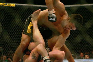 MANCHESTER, UNITED KINGDOM - APRIL 21: Lyoto Machida of Brazil and David Heath of England in action during a Welterweight bout of the Ultimate Fighting Championship at the Manchester Evening News Arena on April 21, 2007 in Manchester, England. (Photo by Gary M. Prior/Getty Images).